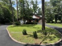Great curb appeal on this 3BD-3BA Golf Course Home at Holly Lake for sale in Holly Lake Ranch Texas Wood County County on GolfHomes.com