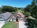 JUST REDUCED! POOL HOME RIGHT ON THE GOLF COURSE! With its prime for sale in Groveland Florida Lake County County on GolfHomes.com