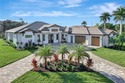 This unparalleled new construction home offers breathtaking for sale in Estero Florida Lee County County on GolfHomes.com