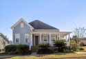 You'll love this welcoming, rocking chair front porch. Beautiful for sale in Tallahassee Florida Leon County County on GolfHomes.com