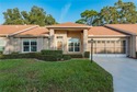 Looking for a style of living WITH low monthly fees, WITH low for sale in New Port Richey Florida Pasco County County on GolfHomes.com