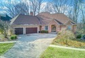 Welcome to this beautifully updated, all-brick multi-level home for sale in Indianapolis Indiana Marion County County on GolfHomes.com