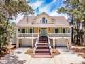 Enjoy the serenity of this home on Porpoise Drive overlooking for sale in Fripp Island South Carolina Beaufort County County on GolfHomes.com