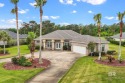 Beautiful home on corner & golf course lot in Craft Farms. Close for sale in Gulf Shores Alabama Baldwin County County on GolfHomes.com