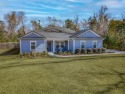 This stunning *Campbell* Pafford built home is tucked away in a for sale in Crawfordville Florida Wakulla County County on GolfHomes.com