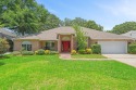 Welcome Home to this amazing all-brick Bluewater Bay home for sale in Niceville Florida Okaloosa County County on GolfHomes.com