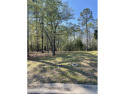 The only golf course lot in Winding River over one-half acre for sale in Bolivia North Carolina Brunswick County County on GolfHomes.com