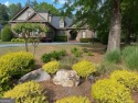 Come see this fully updated luxury home in the gated community for sale in Suwanee Georgia Gwinnett County County on GolfHomes.com