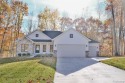 Rare New Construction located in Houghton Lake, MI on Quest Golf for sale in Houghton Lake Michigan Roscommon County County on GolfHomes.com