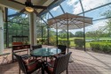 The panoramic view of the lake and golf course welcomes you the for sale in West Palm Beach Florida Palm Beach County County on GolfHomes.com