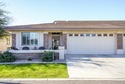 Sit on the north front patio and visit with friendly neighbors for sale in Mesa Arizona Maricopa County County on GolfHomes.com