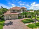 This gorgeous Mediterranean property in Bocaire Country Club is for sale in Boca Raton Florida Palm Beach County County on GolfHomes.com
