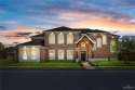 Welcome to this beautiful two-story brick home, ideally situated for sale in Edinburg Texas Hidalgo County County on GolfHomes.com