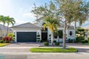 Wow! OVER $200,000 in Updates in Contemporary Meticulous OPEN for sale in Parkland Florida Broward County County on GolfHomes.com