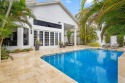 Step into this stunning home, where elegance and modern design for sale in Delray Beach Florida Palm Beach County County on GolfHomes.com