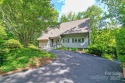 On the 12th hole of the acclaimed Connestee Falls golf course for sale in Brevard North Carolina Transylvania County County on GolfHomes.com