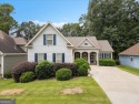Resort-style living starts here! This master-on-main beauty sits for sale in Newnan Georgia Coweta County County on GolfHomes.com