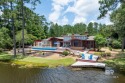 Gated Community.  One level living.  Two waterfront lots for sale in Loxley Alabama Baldwin County County on GolfHomes.com