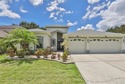 Welcome to this beautifully appointed 4/2 Pool Home with a 3-Car for sale in Valrico Florida Hillsborough County County on GolfHomes.com