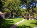Incredibly rare waterfront opportunity in Landa Park Estates! for sale in New Braunfels Texas Comal County County on GolfHomes.com