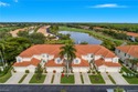 WHAT A VIEW!! of golf course and lake from this ready to move in for sale in Estero Florida Lee County County on GolfHomes.com