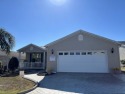 3 BEDROOM - 2 BATHROOM - GOLF COURSE This Triple-wide Palm for sale in Dade City Florida Pasco County County on GolfHomes.com