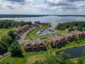 Stunning Furnished Condo on Castle Rock Lake! Discover luxury for sale in Arkdale Wisconsin Adams County County on GolfHomes.com