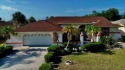 What a find in this neighborhood of picturesque homes!  Tucked for sale in Punta Gorda Florida Charlotte County County on GolfHomes.com
