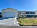 Check out this home! One year old Roof, Glassed Lanai, 22 x 22 for sale in Lady Lake Florida Lake County County on GolfHomes.com