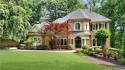 Nestled within the prestigious, gated enclave of Country Club of for sale in Johns Creek Georgia Fulton County County on GolfHomes.com