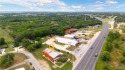 This prime commercial property, strategically located on N for sale in Luling Texas Caldwell County County on GolfHomes.com