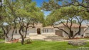 Stunning Santa Barbara appeal abounds in this view-centric for sale in Boerne Texas Bexar County County on GolfHomes.com