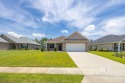 Spacious 2117 sq. ft., 4 bedroom, 3 bath brick home in great for sale in Foley Alabama Baldwin County County on GolfHomes.com