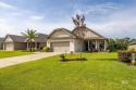 Welcome to 9610 Lakeview Drive, a beautifully maintained 3 for sale in Foley Alabama Baldwin County County on GolfHomes.com