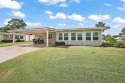 TURNKEY with GOLF CART INCLUDED! Completely UPDATED 2/2 on for sale in Tavares Florida Lake County County on GolfHomes.com