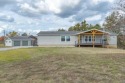 This beautifully remodeled 3-bedroom, 2-bathroom home is for sale in Shell Knob Missouri Barry County County on GolfHomes.com