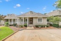 Wake up to stunning lake and golf course views in this for sale in Loxley Alabama Baldwin County County on GolfHomes.com