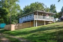 Welcome to this charming fully remodeled cottage style home for sale in Holiday Island Arkansas Carroll County County on GolfHomes.com