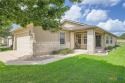 Well-maintained Gray Myst floor plan backing to a peaceful for sale in Georgetown Texas Williamson County County on GolfHomes.com