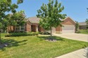 Discover your dream home in this stunning two-bedroom for sale in Frisco Texas Denton County County on GolfHomes.com