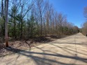 This wooded lot is located down a private drive, only 1 of 3 for sale in Twin Lake Michigan Muskegon County County on GolfHomes.com