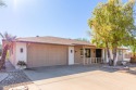 This spacious residence has PAID SOLAR, Plantation Shutters for sale in Sun City West Arizona Maricopa County County on GolfHomes.com