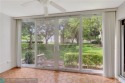 LOVELY LARGEST CORNER FIRST FLOOR CONDO IN WYNMOOR-ALMOST 1700 for sale in Coconut Creek Florida Broward County County on GolfHomes.com