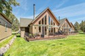 Beautifully updated Chalet located on the 14th fairway of The for sale in Redmond Oregon Deschutes County County on GolfHomes.com