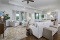 Three floors with 1 condo per floor, this top floor penthouse for sale in Bonita Springs Florida Lee County County on GolfHomes.com