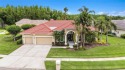 Welcome to this exquisitely appointed residence nestled within for sale in Lutz Florida Hillsborough County County on GolfHomes.com