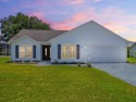 LOCATION! UPDATES! NO KISSING LANAIS! AND LOTS OF OUTDOOR SPACE! for sale in Lady Lake Florida Sumter County County on GolfHomes.com