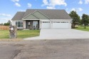 Welcome to your dream home in the Wolf Mountain Golf Course for sale in Wister Oklahoma Le Flore County County on GolfHomes.com