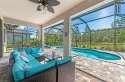 This Putle Marina floor plan, has a spacious open-concept for sale in Estero Florida Lee County County on GolfHomes.com