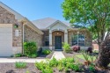 Welcome home to 123 Trinity Drive in Kyle, Texas.  This super for sale in Kyle Texas Hays County County on GolfHomes.com